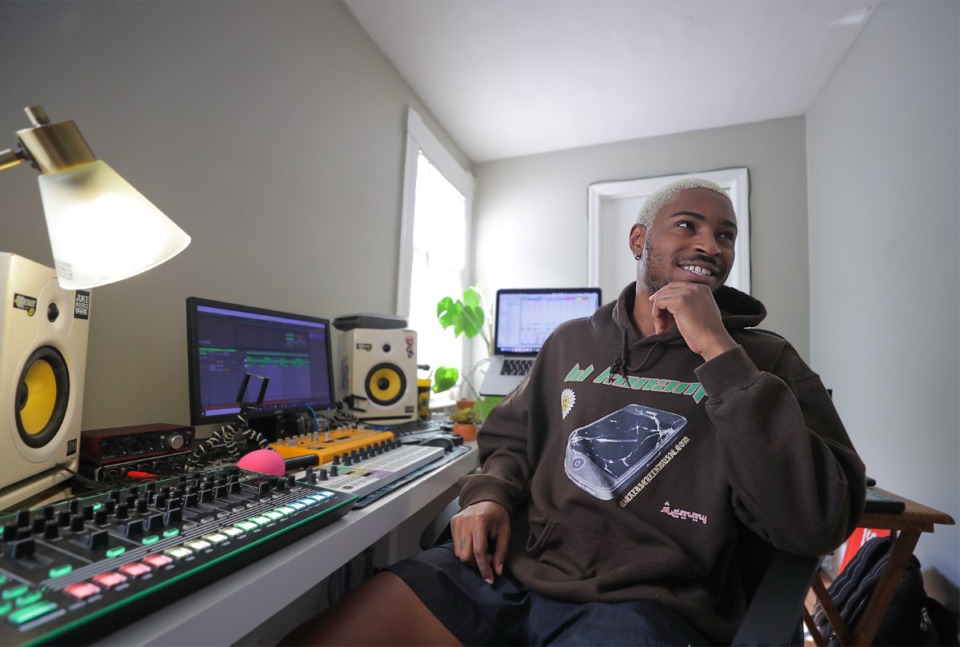 <strong>Native Memphian DJ and producer Qemist sits in his studio at his Midtown home.</strong> (Patrick Lantrip/The Daily Memphian)