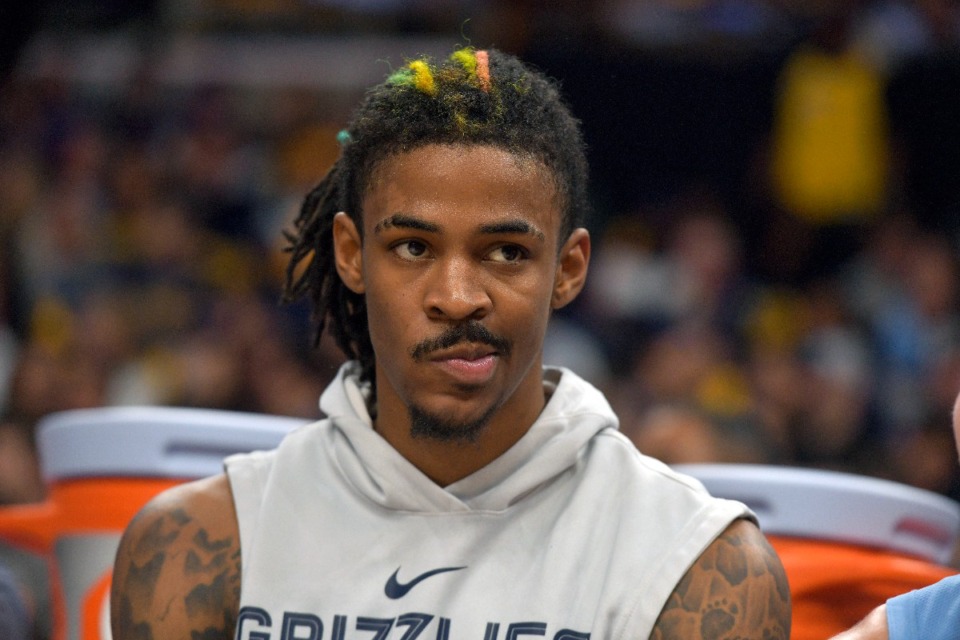 <strong>Memphis Grizzlies guard Ja Morant sits on the bench during the first half of Game 5 in a first-round NBA basketball playoff series against the Los Angeles Lakers Wednesday, April 26, 2023, in Memphis.</strong> (Brandon Dill/AP File)