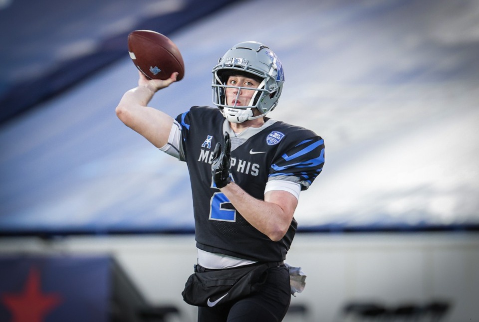 <strong>University of Memphis quarterback Seth Henigan (2) throws the ball during the Tigers' Friday Night Lights spring game April 21, 2023.</strong> (Patrick Lantrip/The Daily Memphian)