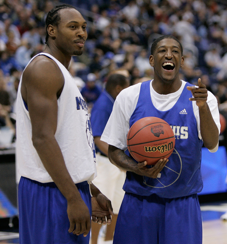<strong>Memphis' Joey Dorsey, left, and Willie Kemp joke around during a practice session for the college basketball Final Four Friday, April 4, 2008, in San Antonio.</strong> (Mark Humphrey/AP File)