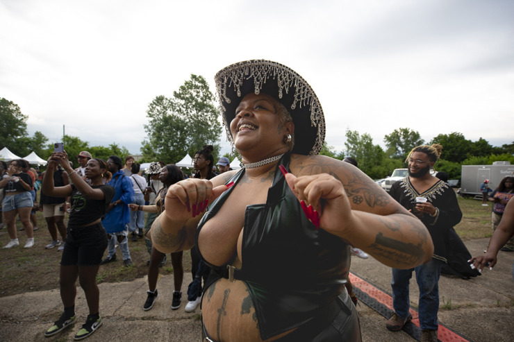 <strong>Tone executive director Victoria Jones dances in a crowd at the main stage of the Tone Juneteenth Festival in Orange Mound on Sunday, June 18, 2023.</strong> (Ziggy Mack/Special to The Daily Memphian)