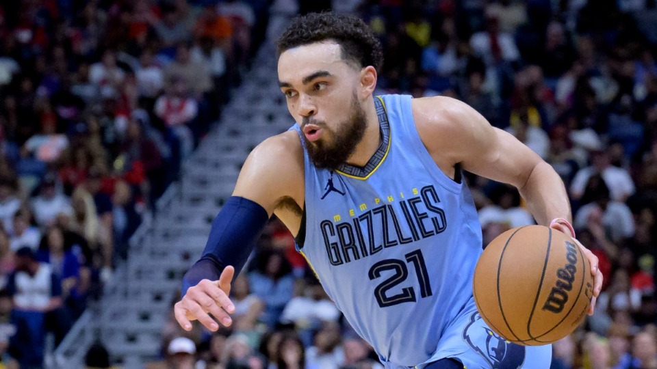 <strong>Memphis Grizzlies guard Tyus Jones (21) dribbles in the first half of an NBA basketball game in New Orleans, Wednesday, April 5, 2023.</strong> (AP Photo/Matthew Hinton)