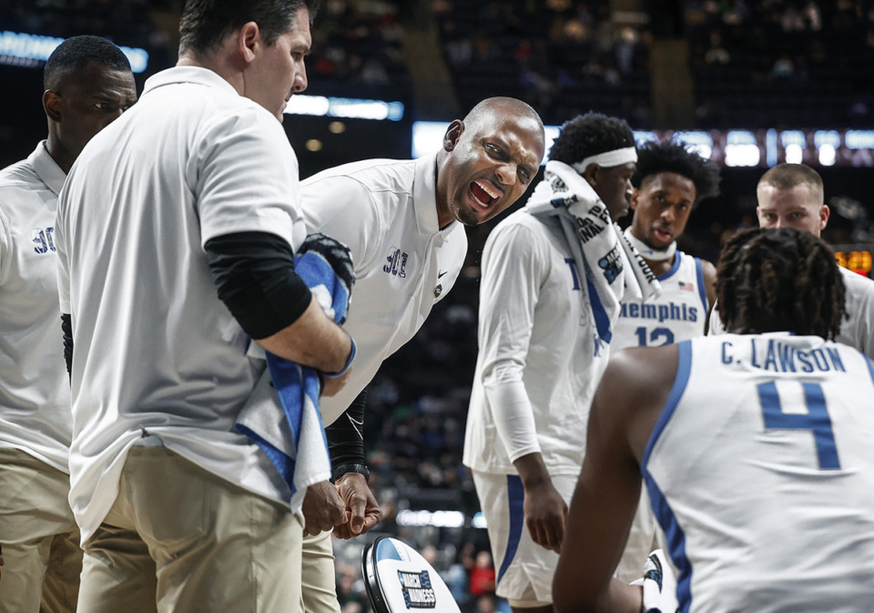 <strong>University of Memphis head coach Penny Hardaway (middle) encourages his players during a timeout against Florida Atlantic University in their NCAA tournament game March 17 in Columbus, Ohio.</strong> (Mark Weber/The Daily Memphian file)