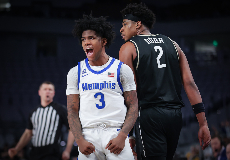 <strong>Memphis guard Kendric Davis (3) celebrates a three during a March 10, 2023 game against UCF.</strong> (Patrick Lantrip/The Daily Memphian file)