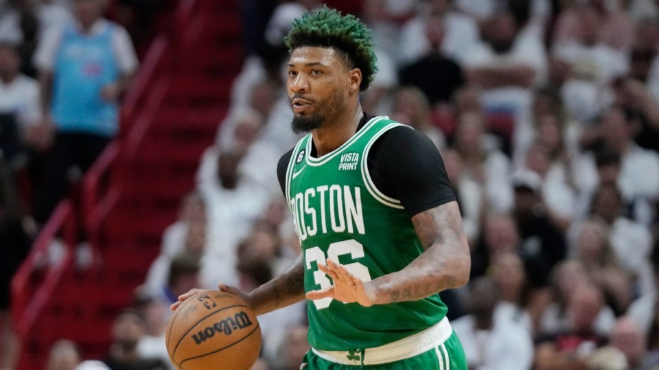 <strong>Boston Celtics guard Marcus Smart (36) dribbles the ball during Game 4 of the NBA basketball playoffs Eastern Conference finals against the Miami Heat, Tuesday, May 23, 2023, in Miami.</strong> (AP Photo/Wilfredo Lee)