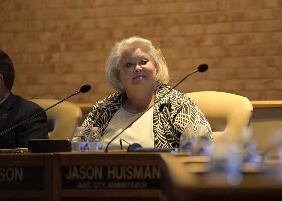 <strong>Mary Anne Gibson listens to a colleague during a Germantown Board of Mayor and Aldermen meeting July 12, 2021.</strong> (Houston Cofield/Special To The Daily Memphian)