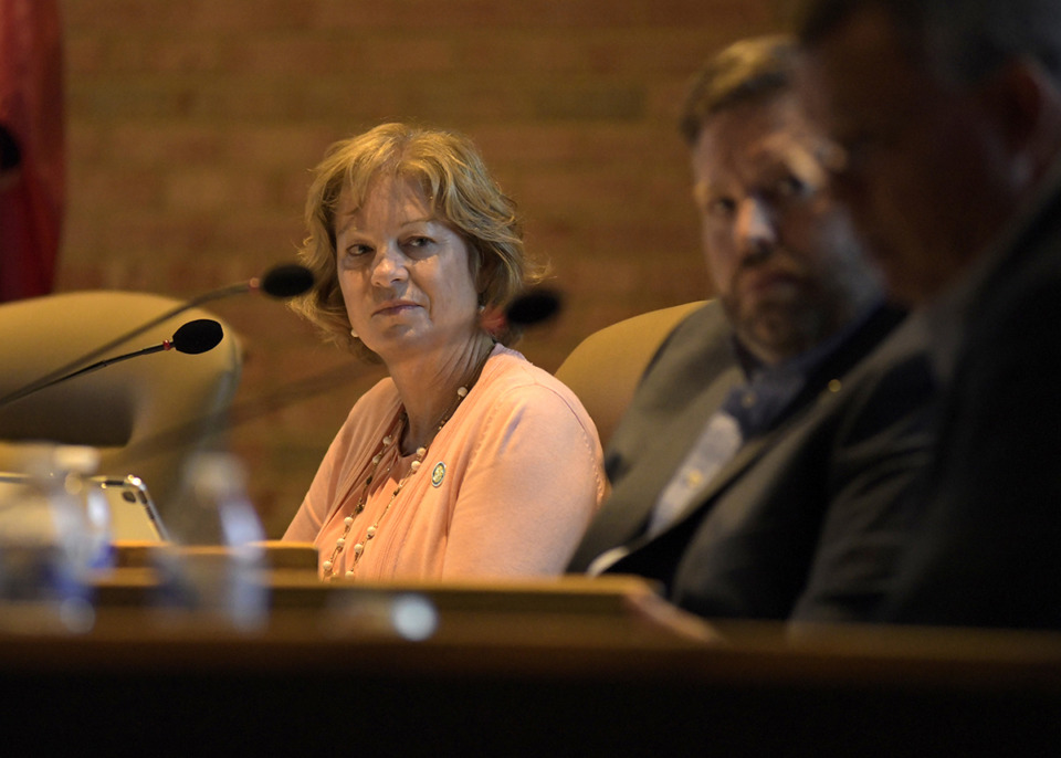 <strong>Sherrie Hicks listens to a colleague during a Germantown Board of Mayor and Aldermen meeting July 12, 2021.</strong> (Houston Cofield/Special To The Daily Memphian)