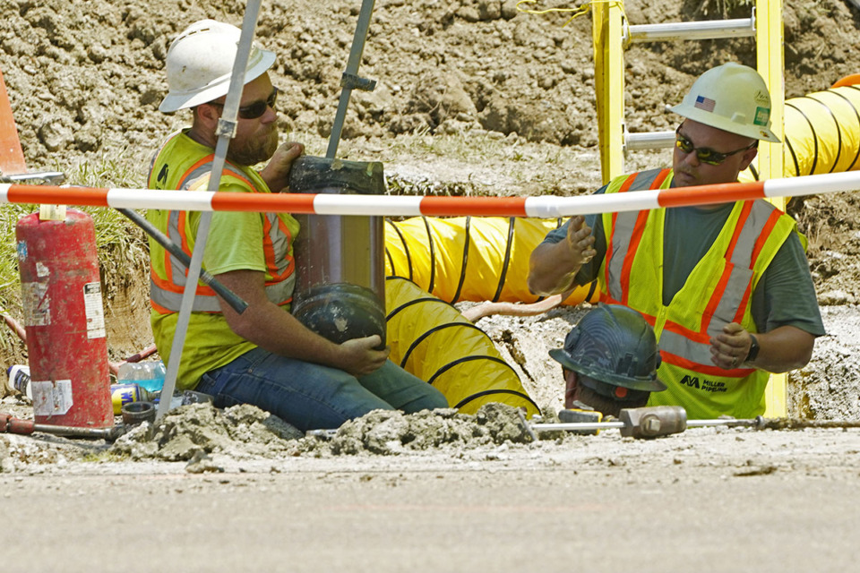 <strong>Utility workers attempt to stay in the shade as they work on a gas line in Jackson, Miss., Wednesday, June 28, 2023.</strong> (Rogelio V. Solis/AP Photo)
