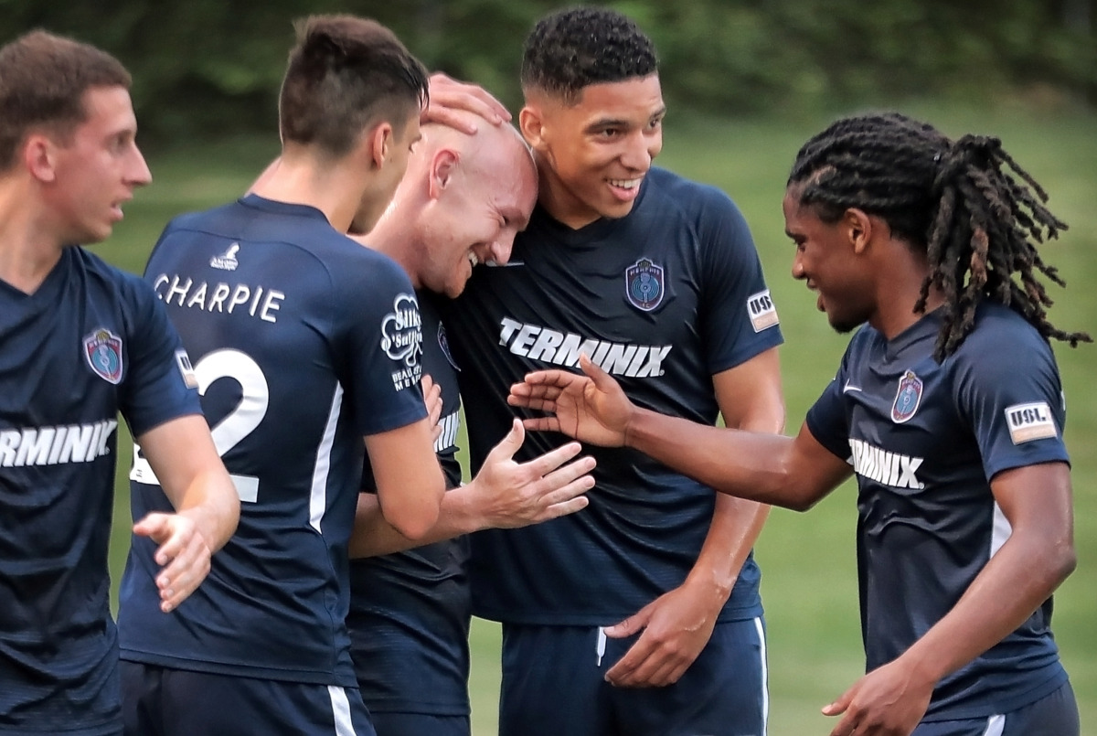 <strong>Memphis forward Jochen Graf (center) celebrates with teammates after a goal in the first half during 901 FC's third-round win over the Hartford Athletic during their Lamar Hunt U.S. Open Cup tournament game at the Mike Rose Soccer Complex on May 29, 2019. Graf scored his first two goals for the Memphis franchise during the 4-0 win.&nbsp;</strong>(Jim Weber/Daily Memphian)