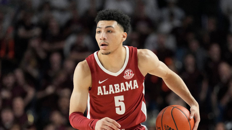 <strong>Alabama guard Jahvon Quinerly (5) looks to pass the ball against Texas A&amp;M during the first half of an NCAA college basketball game Saturday, March 4, 2023, in College Station, Texas.</strong> (AP File Photo/Sam Craft)