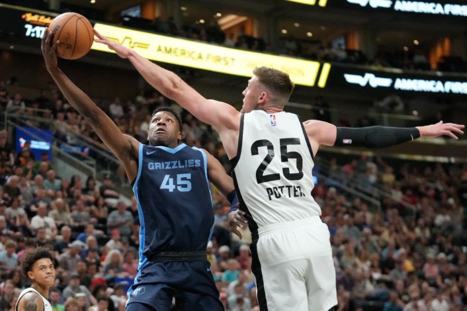 <strong>Memphis Grizzlies forward GG Jackson ll (45) goes up against Utah Jazz center Micah Potter (25) on Thursday, July 6, 2023, in Salt Lake City.</strong> (Rick Bowmer/AP)