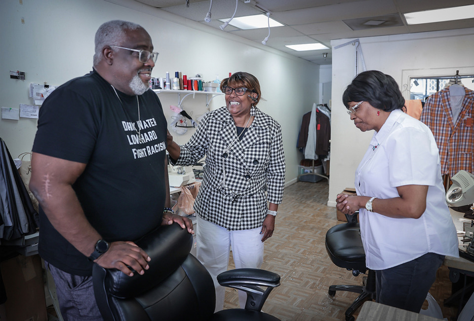 <strong>Girley Hines (center), and her longtime employee Glenda Moore (right), laugh with customer Jai Boyd at Hines Reweaving and Alterations at 139 Madison Ave.</strong> (Patrick Lantrip/The Daily Memphian)