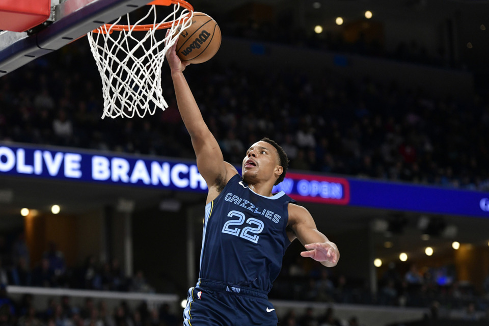 <strong>Memphis Grizzlies guard Desmond Bane (22) shoots in the second half of a game against the Orlando Magic March 28 at FedExForum.</strong> (Brandon Dill/AP file)