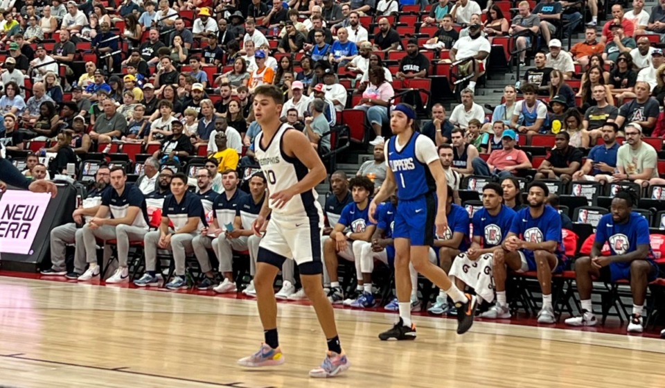 <strong>Arlington High product Nathan Hoover (left) plays for the Memphis Grizzlies at summer league against the Los Angeles Clippers.</strong> (Drew Hill/The Daily Memphian)