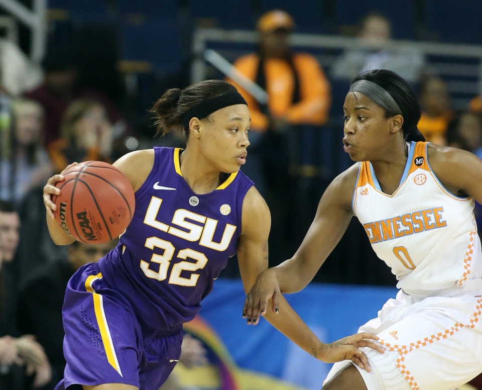 <strong>LSU guard Danielle Ballard (32) drives against Tennessee guard Jordan Reynolds (0) first half of a third-round women's Southeastern Conference tournament NCAA college basketball game Friday, March 7, 2014, in Duluth, Ga.</strong> (Jason Getz/AP File)