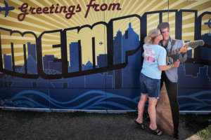 <strong>Cheryl Benson gives Elvis a little affection on the final day of the 2019 World Championship Barbecue Cooking Contest at Tom Lee Park on May, 18, 2019. As a successful Memphis in May International Festival unfolded in the park, there was plenty of symbolism and drama building in the controversy over what happens next there.</strong> (Jim Weber/Daily Memphian)