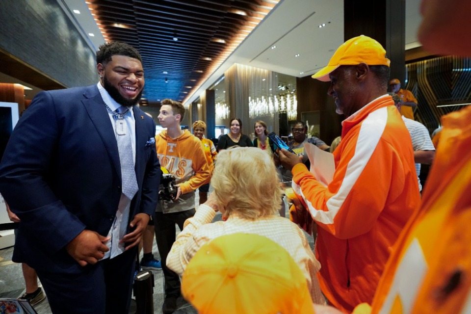 <strong>Tennessee defensive lineman Omari Thomas visits with fans during the Southeastern Conference NCAA college football media days, Thursday, July 20, 2023, in Nashville.</strong> (George Walker IV/AP)