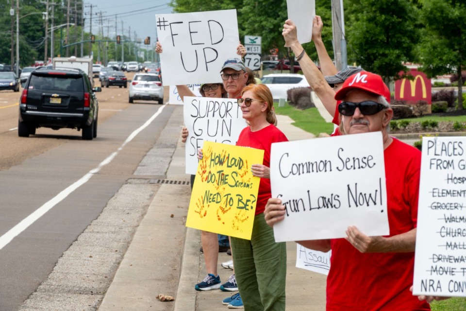 <strong>A group with Moms Demand Action protest in Collierville, along Poplar Avenue Saturday, May 13, 2023 as part of a national protest for gun legislation.</strong> (Greg Campbell/Special to The Daily Memphian file)