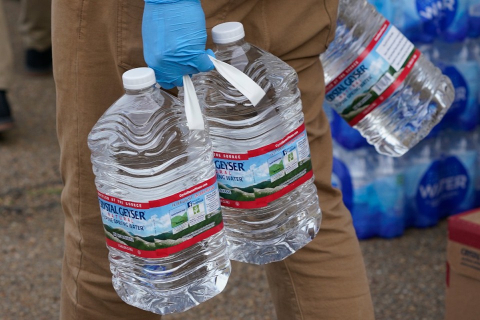 <strong>City of Germantown water has yet to pass water quality tests, and residents are warned to continue using bottled water.</strong> (Rogelio V. Solis/AP)