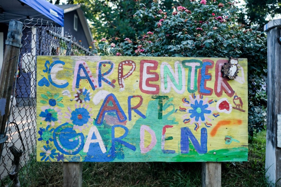 <strong>A hand-painted sign marks the entrance of the Carpenter Art Garden in 2016.</strong> (The Daily Memphian file)