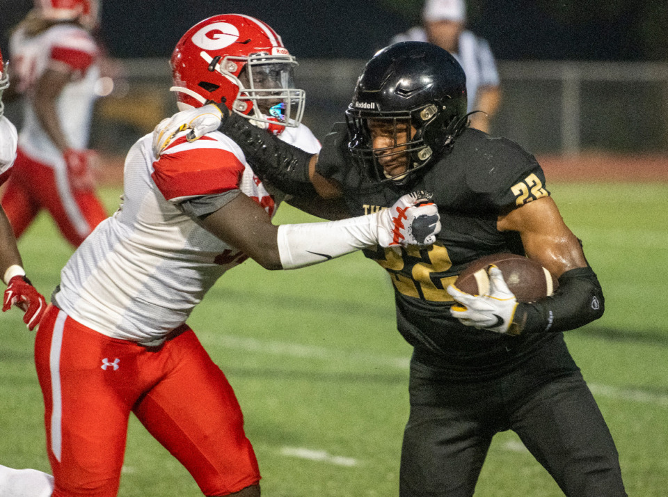 <strong>This year&rsquo;s MSCIAA high school football jamborees will take place Thursday, Aug. 10. Both Germantown (in red) and Whitehaven (in black) will be playing. The Red Devils will play Southwind at 6:35 p.m. at Cordova High. The Tigers will be at home and face Fairley at 6 p.m.</strong> (Greg Campbell/Special for The Daily Memphian file)