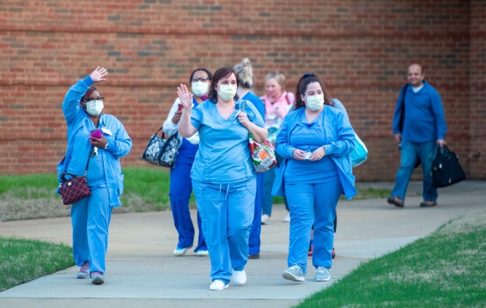 <strong>Nurses and staff exit Baptist Memorial Hospital-Collierville on March 29, 2020. Baptist Memorial Health Care and UTHSC are partnering to increase the number of nursing students heading to the operating room.</strong> (Greg Campbell/The Daily Memphian file)