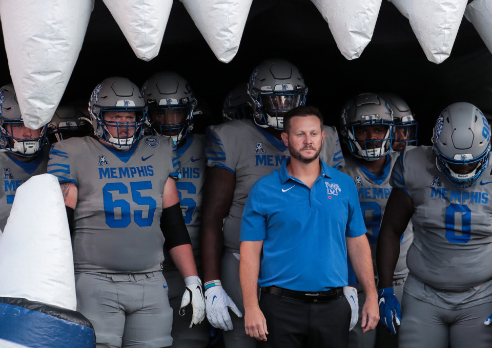 <strong>University of Memphis football players say head coach Ryan Silverfield, center, is&nbsp;&ldquo;always involved&rdquo; with his team, which gives him insight to their behavior off the field.</strong>&nbsp;(Patrick Lantrip/The Daily Memphian file)