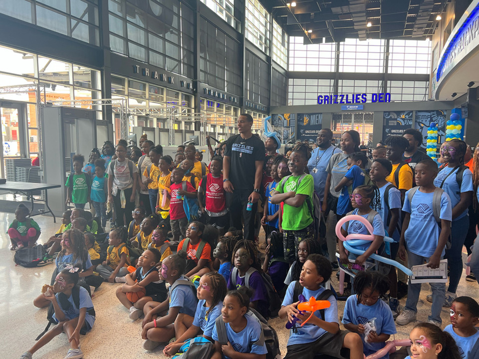 <strong>Memphis Grizzlies guard Desmond Bane (center) gave away backpacks and basketball tickets to members of the Boys and Girls Clubs on Thursday, Aug. 3.</strong> (Drew Hill/The Daily Memphian)