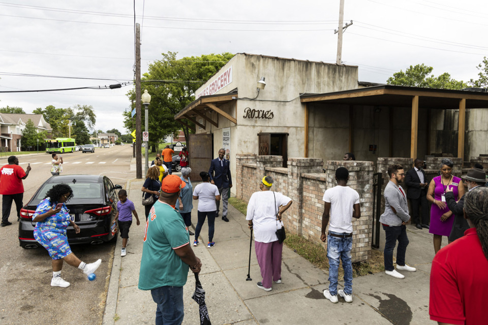 <strong>Residents gather at Roxie's Grocery, a North Memphis staple for nearly 40 years, to honor founders Floyd and Roxie Miller Friday, Aug. 4.</strong> (Brad Vest/Special to The Daily Memphian)