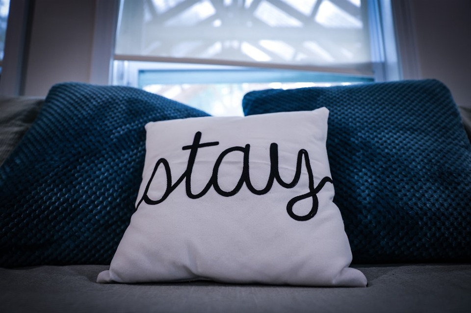 <strong>A decorative pillow that reads &ldquo;stay&rdquo; welcomes guests to Lenore Turner&rsquo;s Airbnb in Cooper Young July 21, 2023.</strong> (Patrick Lantrip/The Daily Memphian)
