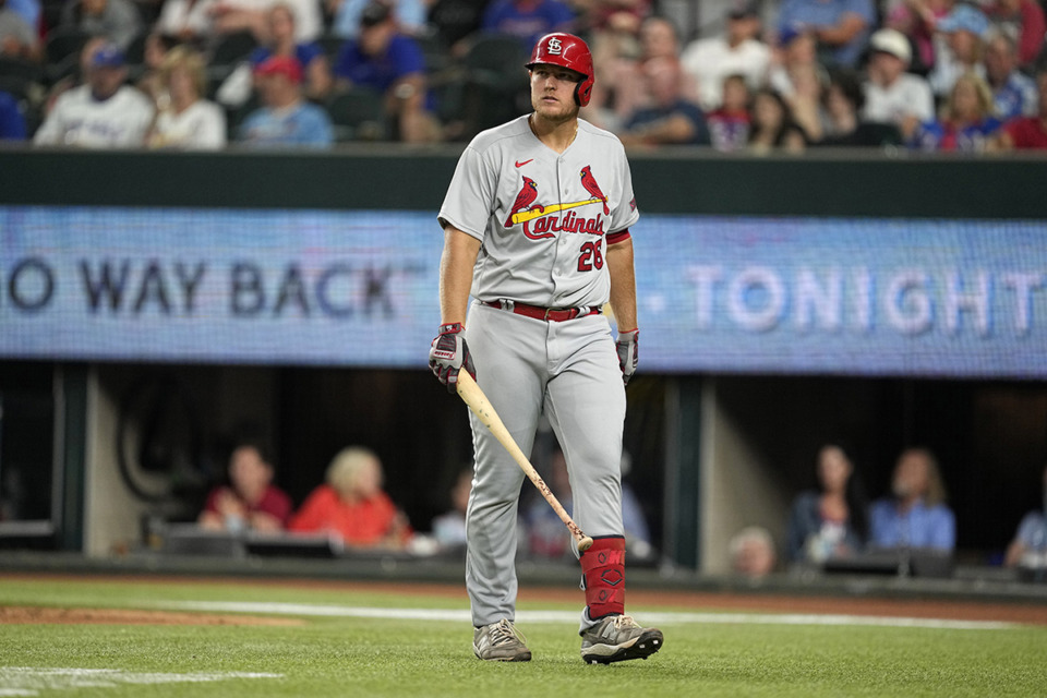<strong>St. Louis Cardinals' Luken Baker walks to the dugout during a game against the Texas Rangers June 5 in Arlington, Texas. Playing for the Redbirds Sunday, Aug. 6, at AutoZone Park, Baker had two home runs in an 8-6 loss, giving him 31 on the season.</strong> (Tony Gutierrez/AP Photo file)