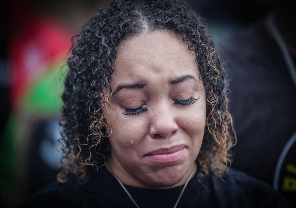 <strong>Ashley McKenzie Smith, the mother of Jaylin McKenzie, tries to hold back tears at a Aug. 8 press conference demanding justice for her son outside of the Mount Moriah Memphis Police Department precinct.</strong> (Patrick Lantrip/The Daily Memphian)