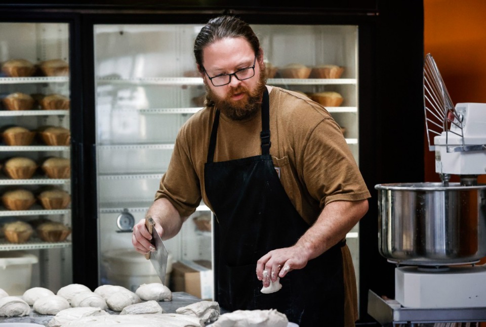 <strong>Dan Beach prepares dough at Wild Cultures Sourdough Bakery in Hernando, which specializes in natural fermentation-style baking techniques.</strong> (Mark Weber/The Daily Memphian file)
