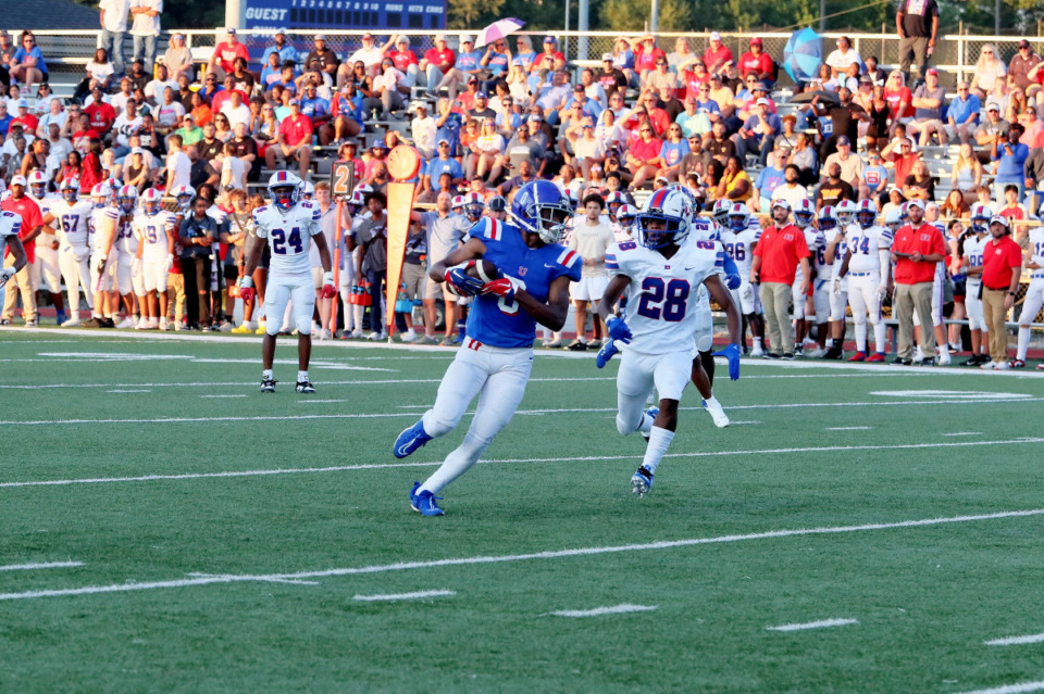 <strong>MUS standout Brandon Nicholson hauls in a pass during the Owls 37-0 season-opening win over the Bartlett Panthers.</strong> (Photo courtesy Gerald &ldquo;Jerry&rdquo; Gallik)