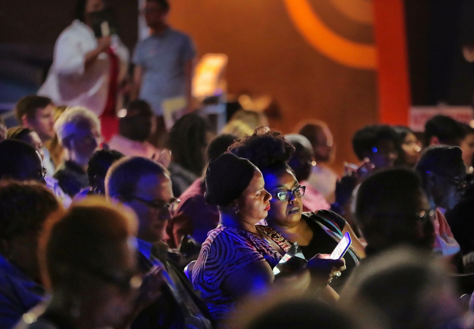 <strong>Residents divided by City Council districts use their cell phones to vote during the People's Convention on June 8, 2019, at the Paradise Entertainment Center as politicians, activists and engaged voters gather to select a slate of candidates in the local October elections.</strong> (Jim Weber/Daily Memphian)