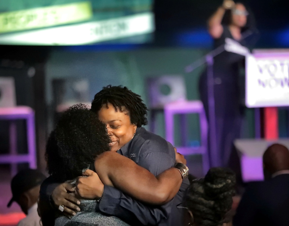 <strong>Rev. Sharon Moore (right) embraces fellow clergy Rev. Cetrea Jimersom as politicians stump during the People's Convention on June 8, 2019, at the Paradise Entertainment Center.</strong> (Jim Weber/Daily Memphian)