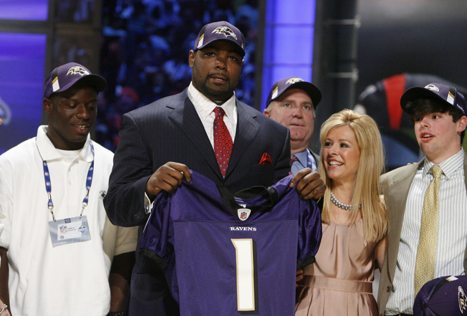 <strong>Michael Oher, center, filed a motion Monday, Aug. 21, to compel the Tuohys to file an &ldquo;account&rdquo; covering the 19-year span of the conservatorship, which Oher filed to end.</strong> (Jason DeCrow/AP Photo file)