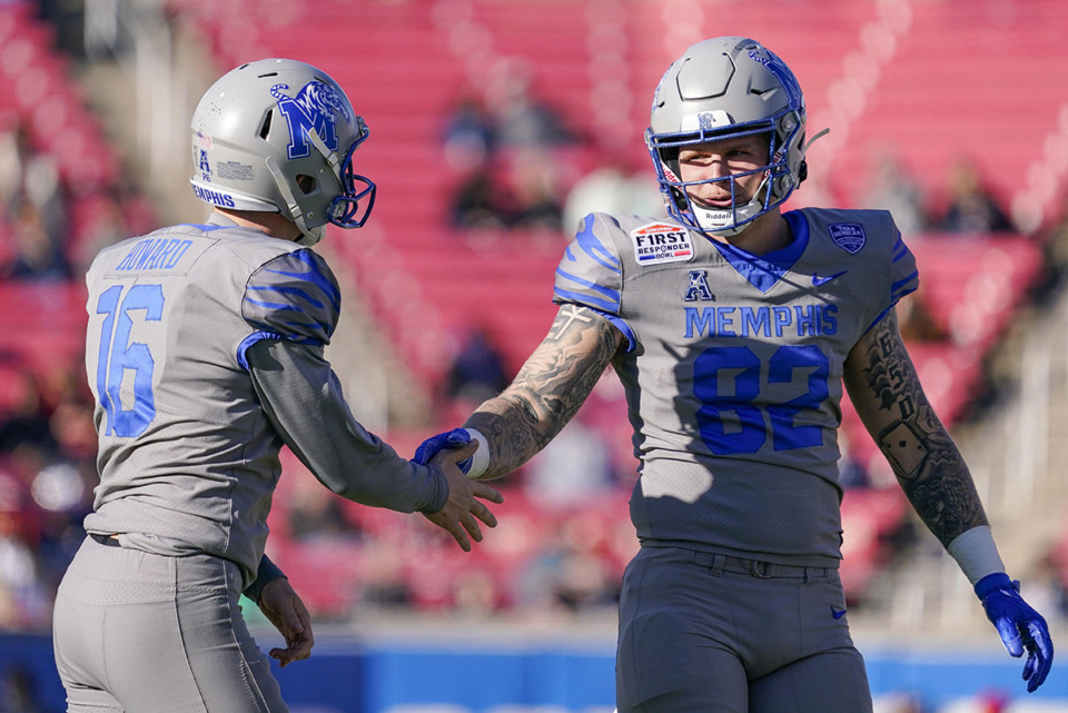 <strong>Memphis place kicker Chris Howard (16) is congratulated by tight end Anthony Landphere (82) after making a field goal during the first half of the First Responder Bowl NCAA college football game against Utah State Dec. 27, 2022, in Dallas.</strong> (Sam Hodde/AP file)
