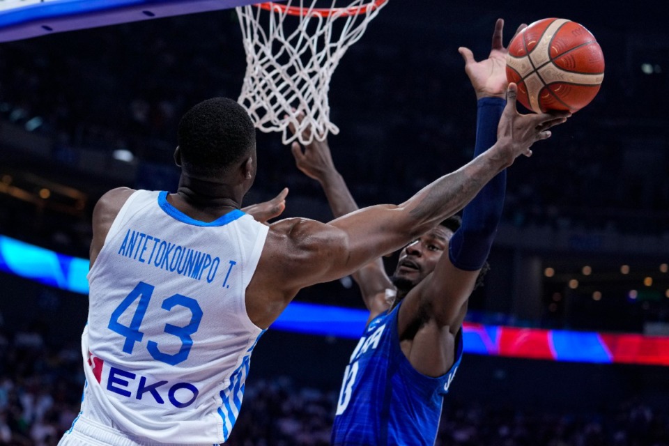 <strong>U.S. forward Jaren Jackson Jr. (13) blocks the shot over Greece forward Thanasis Antetokounmpo (43) during the second half of a Basketball World Cup group C match in Manila, Philippines Monday, Aug. 28, 2023.</strong>(AP Photo/Michael Conroy)