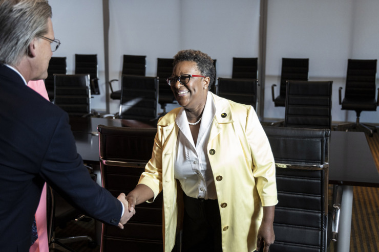 <strong>Eric Barnes, CEO of The Daily Memphian, left, greets mayoral candidate Karen Camper, right, before the start of The Daily Memphian Mayoral Debate at WKNO Aug. 15. Camper said at the debate that she wants to address the root causes of crime with &ldquo;intervention and prevention.&rdquo;</strong> (Brad Vest/Special to The Daily Memphian)