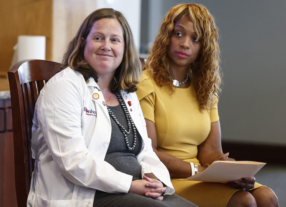 <strong>Dr. Regan Williams (left), director of trauma services Le Bonheur Children&rsquo;s Hospital, and Stacie Payne, fellow with Everytown Survivor Network, attend the press conference announcing a partnership between University of Memphis Law School and Everytown Law Fund on Wednesday, Aug. 30, 2023.</strong> (Mark Weber/The Daily Memphian)