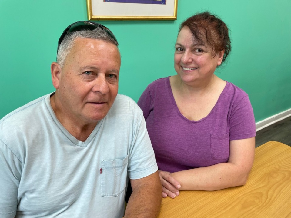 <strong>Rodolfo Berger, 64, was one of the victims in the shooting rampage that shut the city down on Sept. 7, 2022. His partner, Fabiola Francis, (right) oversaw his recovery while running her catering and restaurant business at 1353 Jackson Ave.</strong> (Jane Roberts/The Daily Memphian)