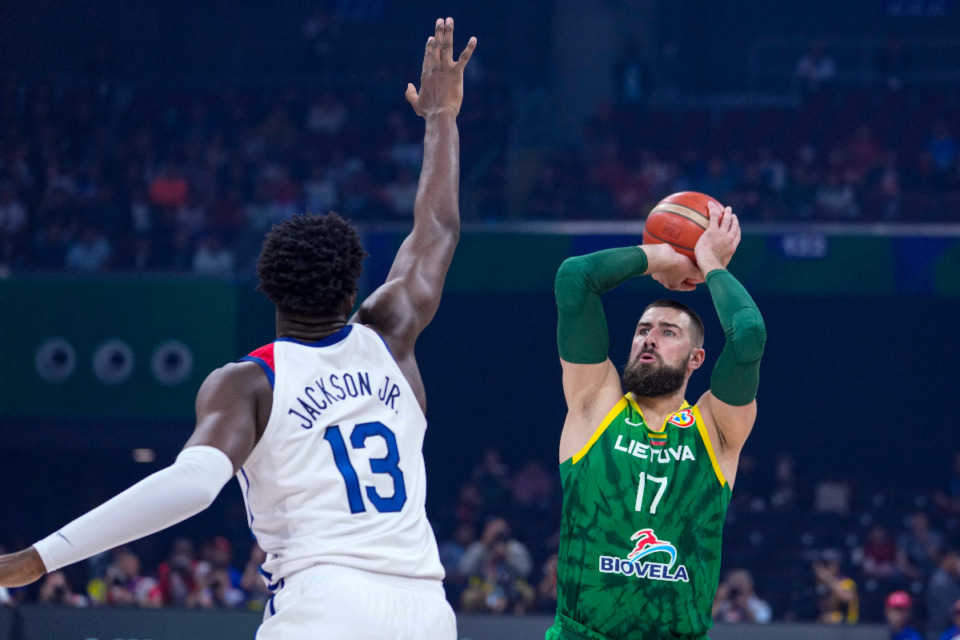 <strong>Lithuania center Jonas Valanciunas (17) shoots over U.S. forward Jaren Jackson Jr. (13) during the first half of a World Cup second-round match in Manila, Philippines Sunday, Sept. 3, 2023. </strong>(AP Photo/Michael Conroy)