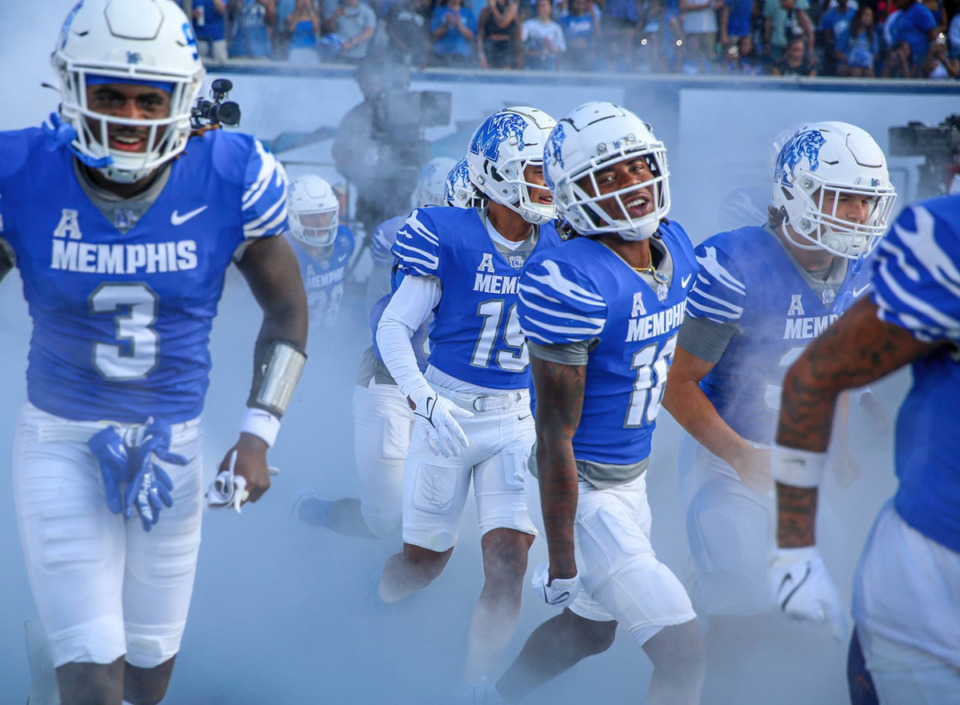 <strong>The University of Memphis Tigers football players run from the tunnel before the Tigers game against Bethune-Cookman Sept. 2.</strong> (Wes Hale/Special to The Daily Memphian)