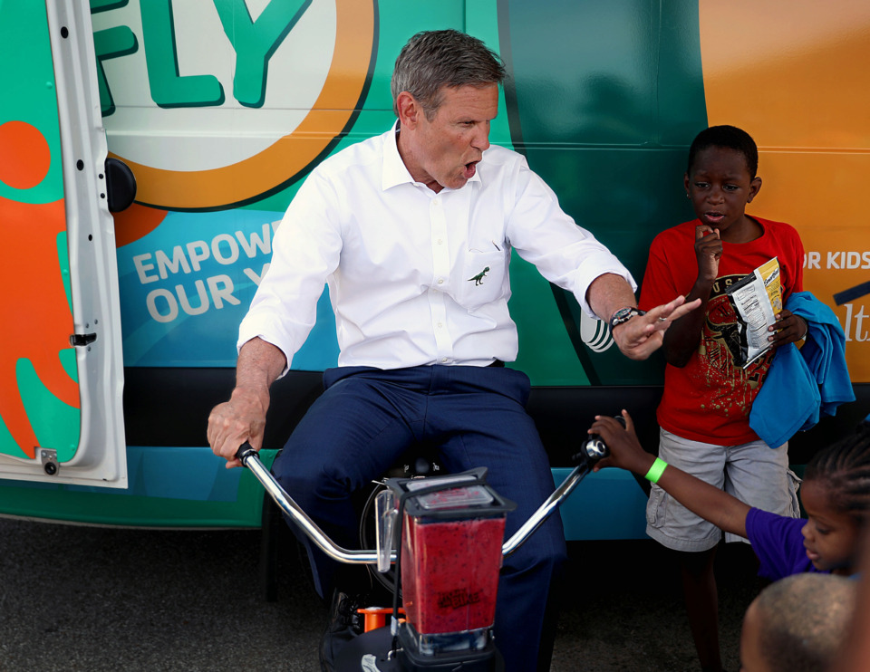 <strong>Gov. Bill Lee blends a bicycle-powered smoothie during a visit to a&nbsp;<span>YMCA mobile area called &ldquo;Y on the Fly&rdquo; </span>at the Greenbriar Apartments Tuesday, June 11.</strong>&nbsp;(Patrick Lantrip/Daily Memphian)