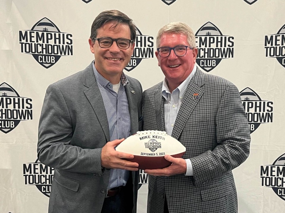 <strong>&ldquo;There is now a generation that has grown up with the Titans and Grizzlies. If you were born in 1990, you&rsquo;ve grown up with pro teams in your home state,&rdquo; Titans Radio voice Mike Keith (left) said Tuesday at the Memphis Touchdown Club. TD Club board member and AutoZone Liberty Bowl associate executive director Harold Graeter stands at right.</strong> (Drew Hill/The Daily Memphian)