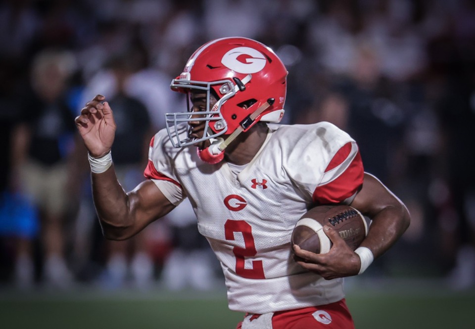 <strong>Germantown quarterback Cordero Walker (2) scrambles for a first down in the Friday, Sept. 1, win over Houston. AP ranks the Red Devils No. 5 in Division 1 -&nbsp;Class 6A.</strong> (Patrick Lantrip/The Daily Memphian)