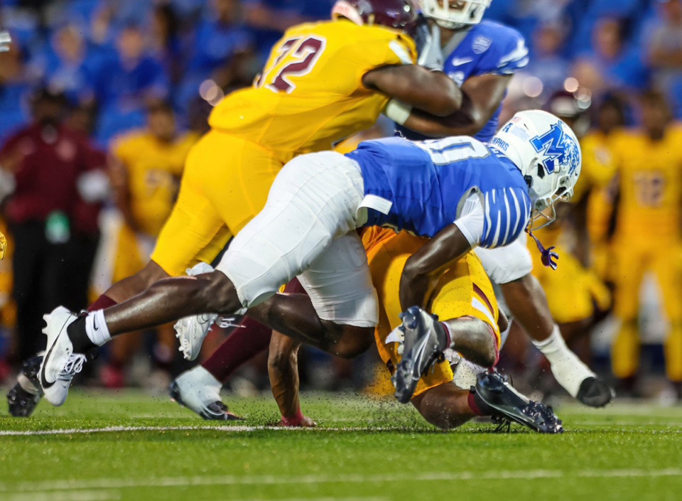 <strong>University of Memphis defensive back An&rsquo;Darius Coffey (10) makes a big play during the Tigers game against Bethune-Cookman on Saturday, Sept. 2, 2023 at Simmons Bank Liberty Stadium.</strong> (Wes Hale/Special to The Daily Memphian)