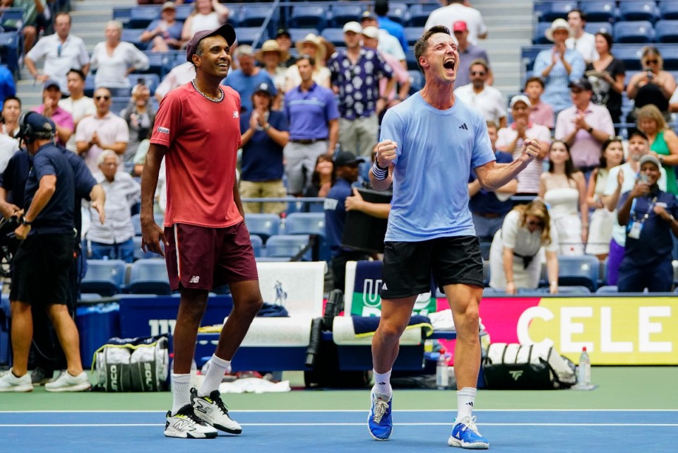 <strong>Joe Salisbury (right), of Great Britain, but a former University of Memphis player, and Rajeev Ram, of the United States, react after defeating Rohan Bopanna, of India, and Matthew Ebden, of Australia, during the men's doubles final of the U.S. Open tennis championships, Friday, Sept. 8, 2023, in New York.</strong> (Frank Franklin II/AP)