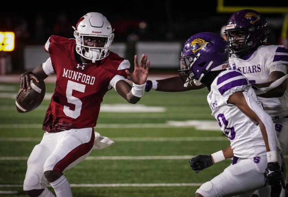 <strong>Munford quarterback Jordan Bell (5) scrambles for a first down during the Sept. 8, 2023, game against Southwind.</strong> (Patrick Lantrip/The Daily Memphian)